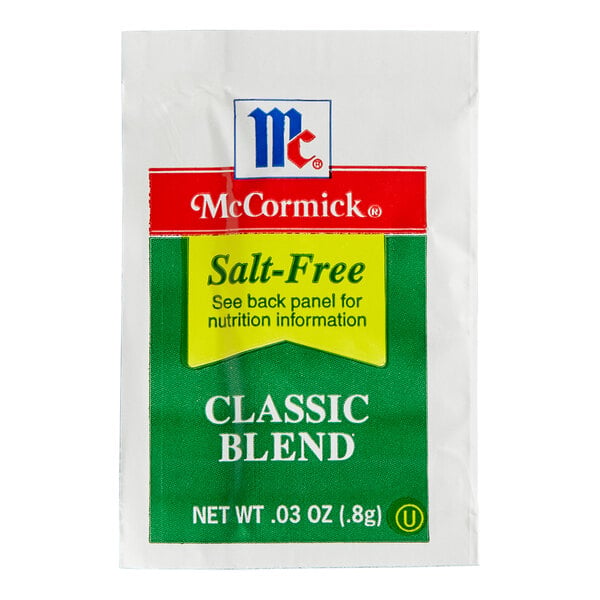 A small white packet labeled 'McCormick Salt-Free Classic Blend' with green and yellow accents and a net weight of 0.03 oz (0.8g).