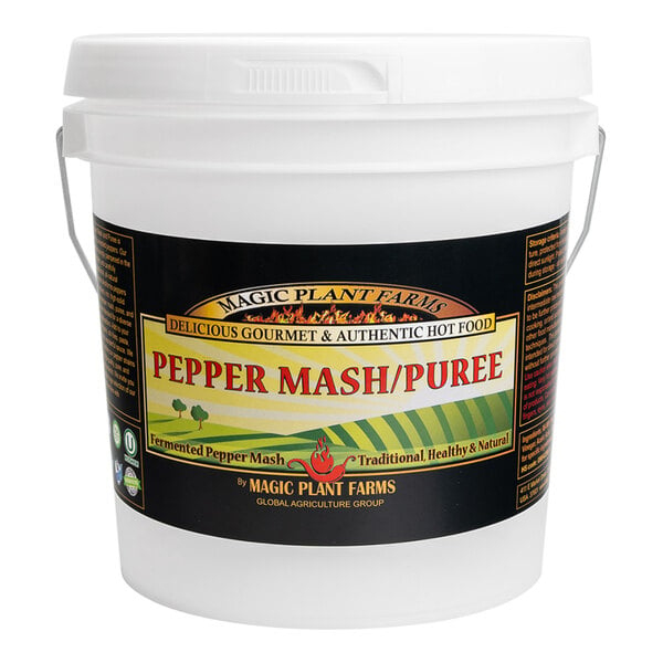 A white plastic bucket with a handle and a black label that reads 'Pepper Mash/Puree' from Magic Plant Farms.