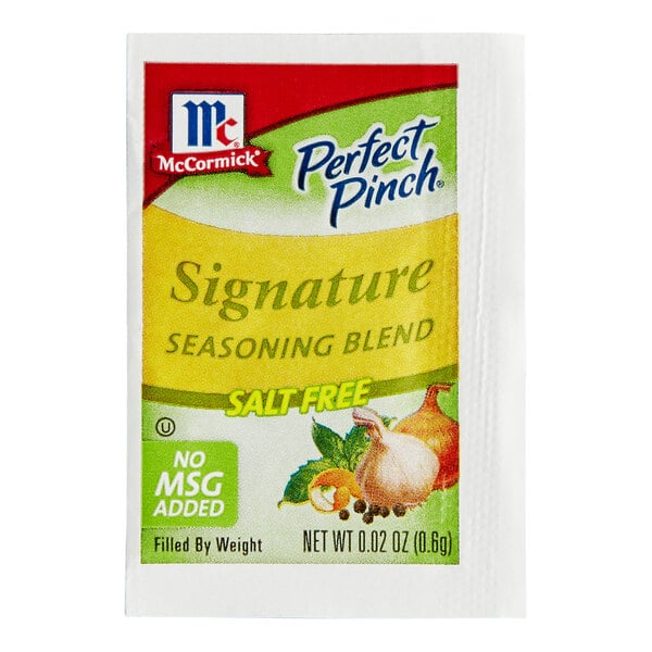 A small packet labeled 'McCormick Perfect Pinch Signature Seasoning Blend,' featuring salt-free and no MSG added claims, with images of vegetables on the front.