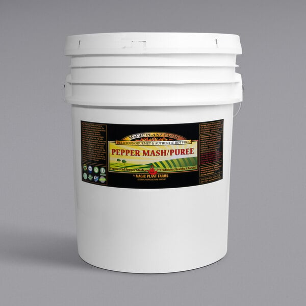 A white bucket with a label for Fiery Farms Red Cayenne Pepper Puree.