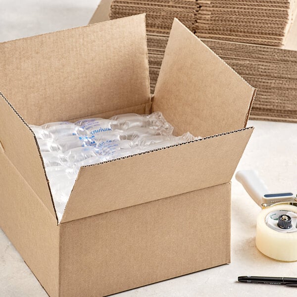 A Lavex corrugated cardboard shipping box with plastic bottles inside.