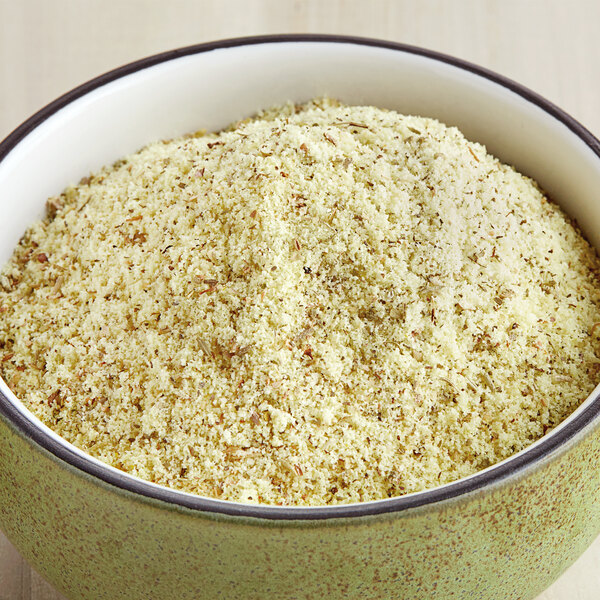 A bowl of McCormick Culinary Lemon 'N Herb seasoning.