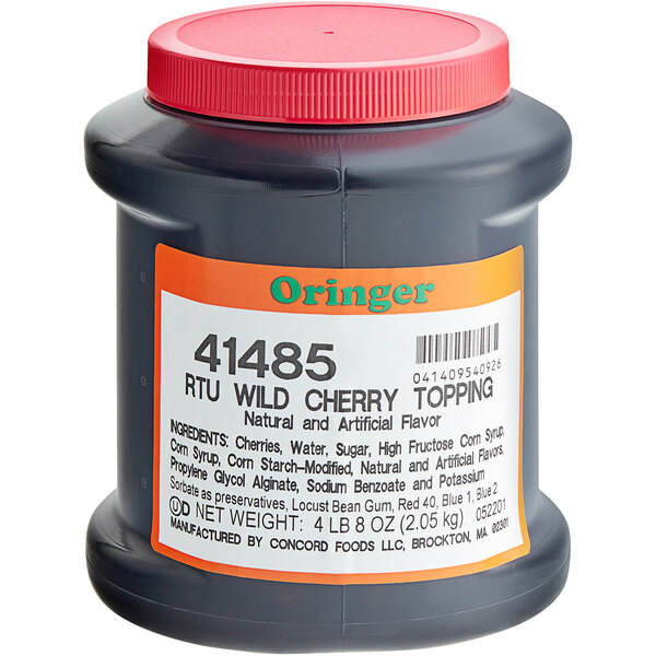 A black Oringer container with a red lid filled with Wild Cherry Dessert Topping.