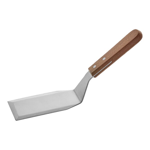 An American Metalcraft solid turner with a wooden handle.