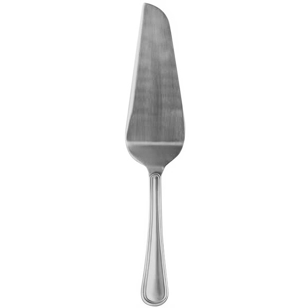 An American Metalcraft stainless steel cake server with a handle and a serrated edge.