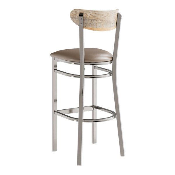 A Lancaster Table & Seating bar stool with a taupe cushion and driftwood back.