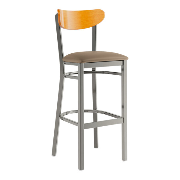 A Lancaster Table & Seating bar stool with a wooden back and cushioned seat.
