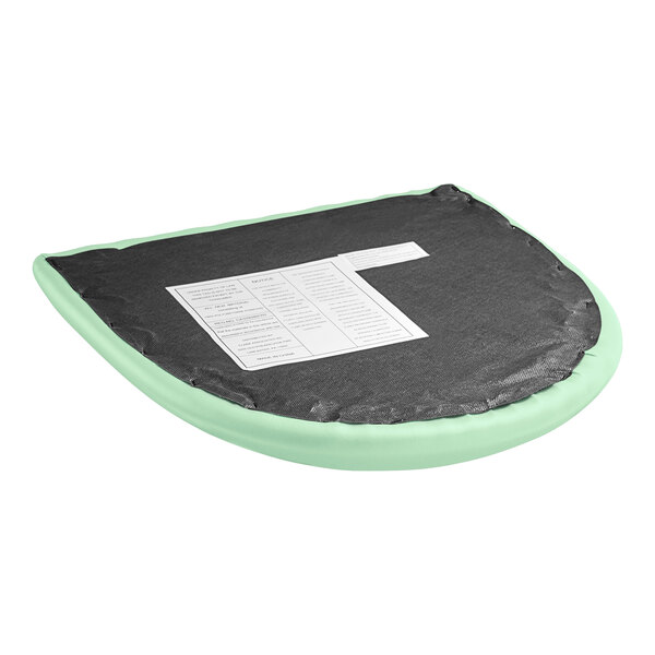 A detached seafoam vinyl cushion with a white label on it.