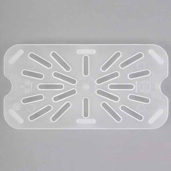 A white translucent plastic Cambro drain tray with holes.