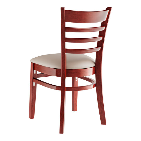 A Lancaster Table & Seating mahogany wood chair with a light gray cushion.