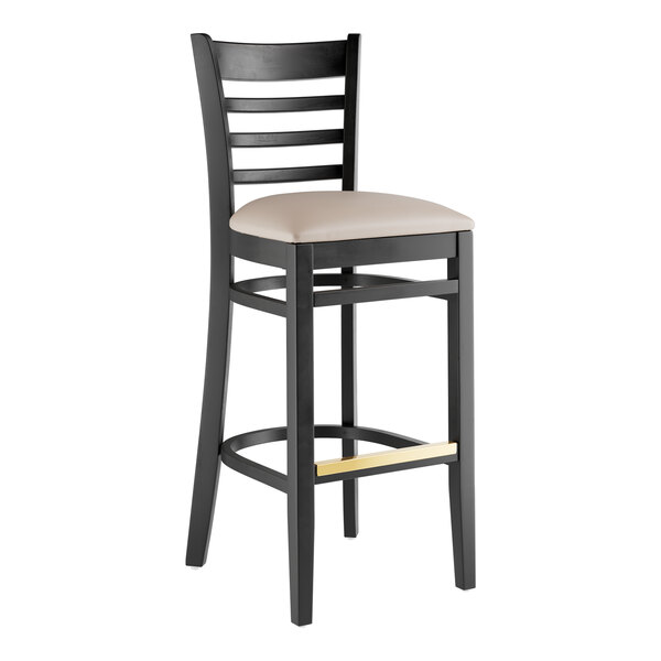 A black wood bar stool with a light gray vinyl seat.
