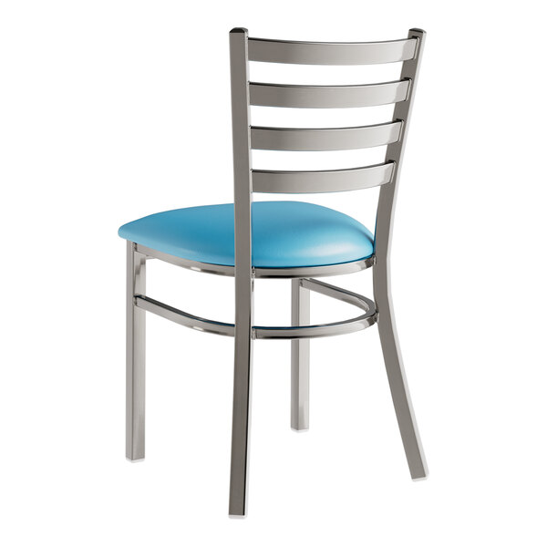 A Lancaster Table & Seating metal ladder back chair with a blue vinyl seat.