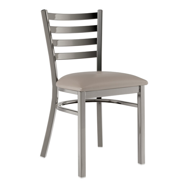 A Lancaster Table & Seating metal ladder back chair with a dark gray cushioned seat.