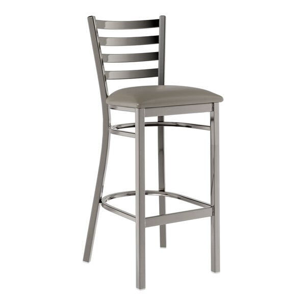 A Lancaster Table & Seating metal ladder back bar stool with a dark gray cushion on the seat.