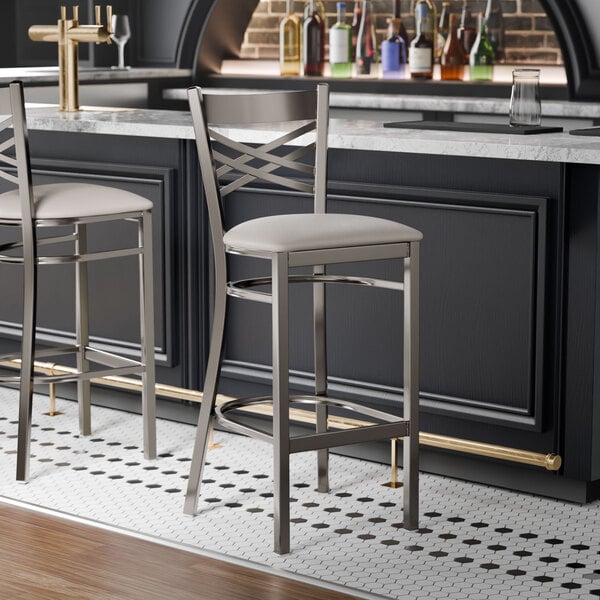 Lancaster Table & Seating Clear Coat Finish Cross Back Bar Stool with 2 1/2" Light Gray Vinyl Padded Seat - Assembled