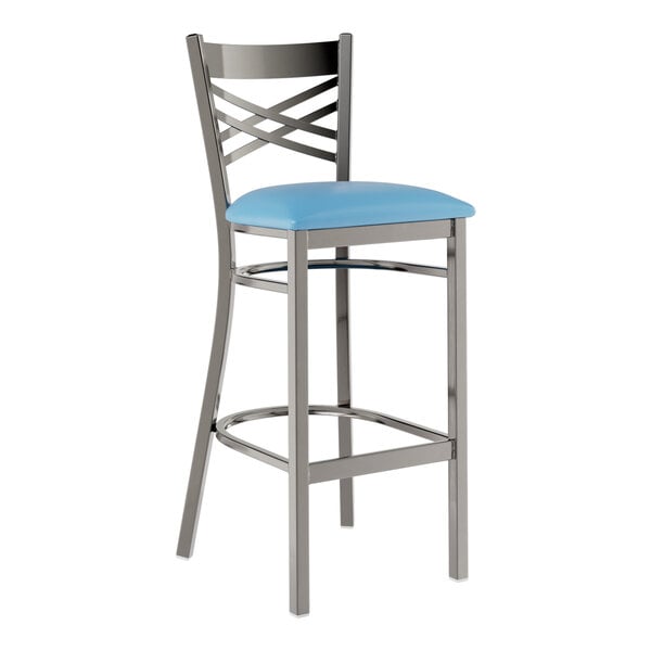 A Lancaster Table & Seating metal bar stool with a blue vinyl seat.