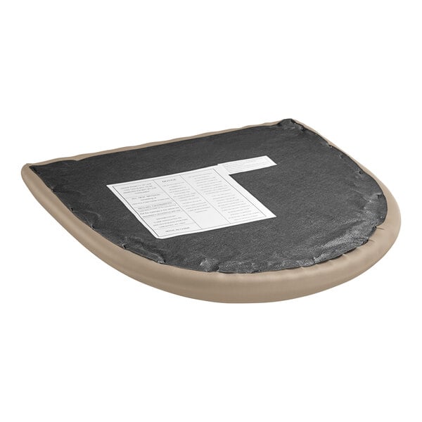 A detached taupe vinyl cushion for a Lancaster Table & Seating black wood ladder back bar stool.