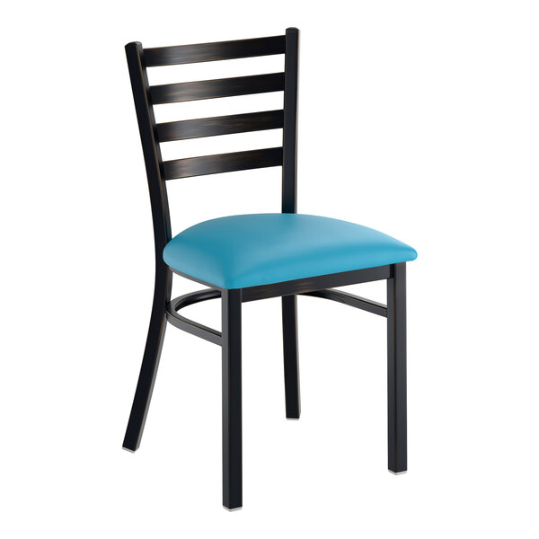 A black ladder back chair with a blue vinyl padded seat.