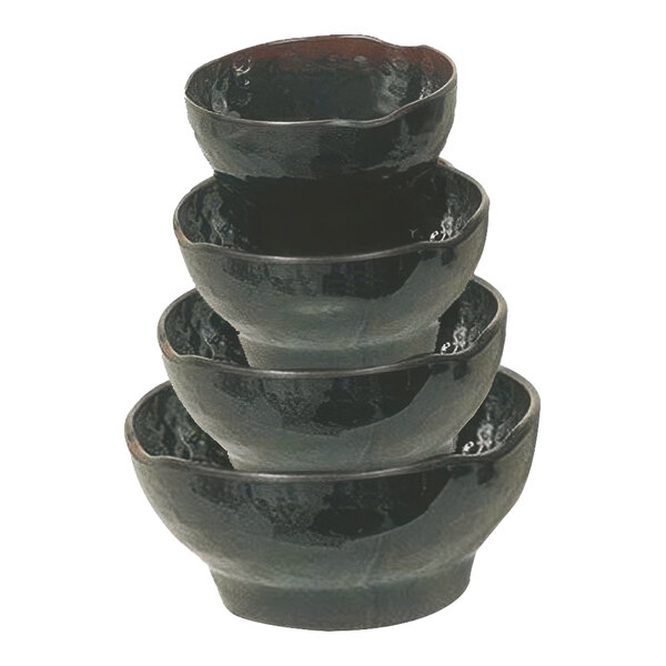 A stack of Thunder Group Tenmoku black melamine rice bowls.