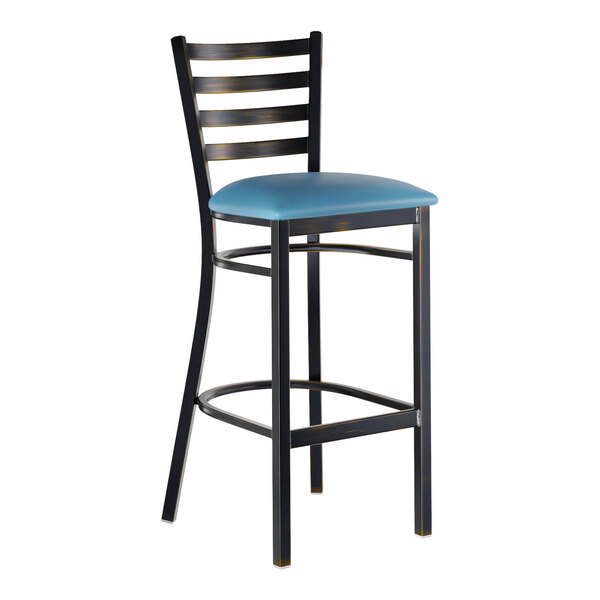 A metal bar stool with a distressed copper finish, ladder back design, and a blue vinyl padded seat.