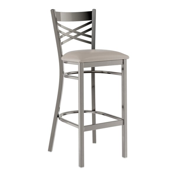 A Lancaster Table & Seating metal cross back bar stool with a light gray cushion