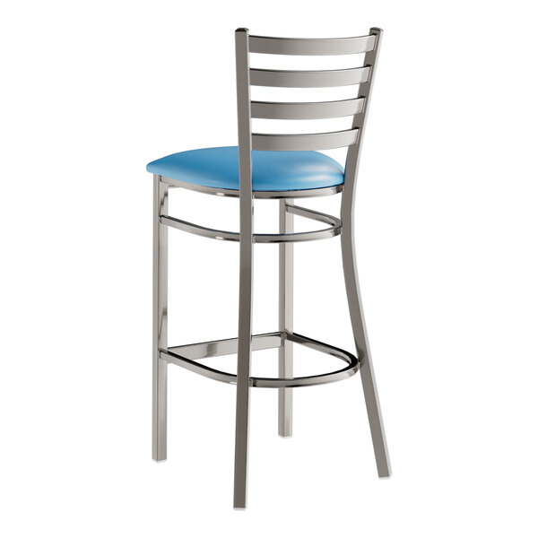 A Lancaster Table & Seating metal bar stool with a blue vinyl seat.