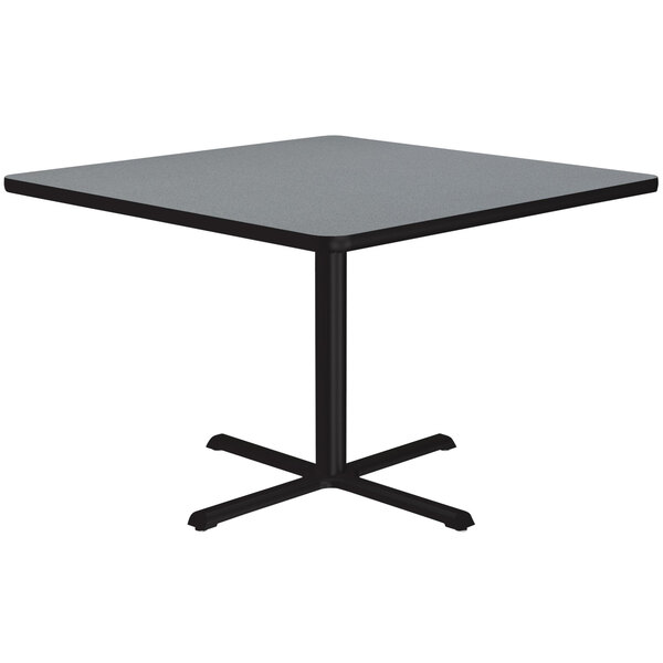 A Correll square table with a black base and gray granite top.