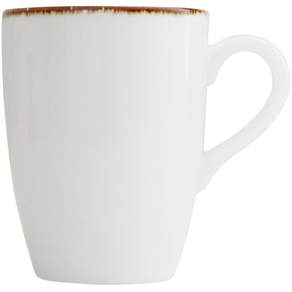 A Fortessa bright white china mug with a white handle and brown rim.