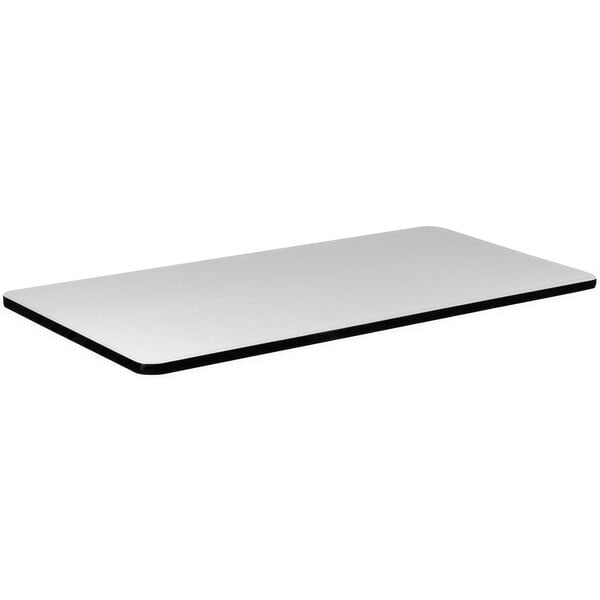 A white rectangular Correll thermal-fused laminate table top with black edges.