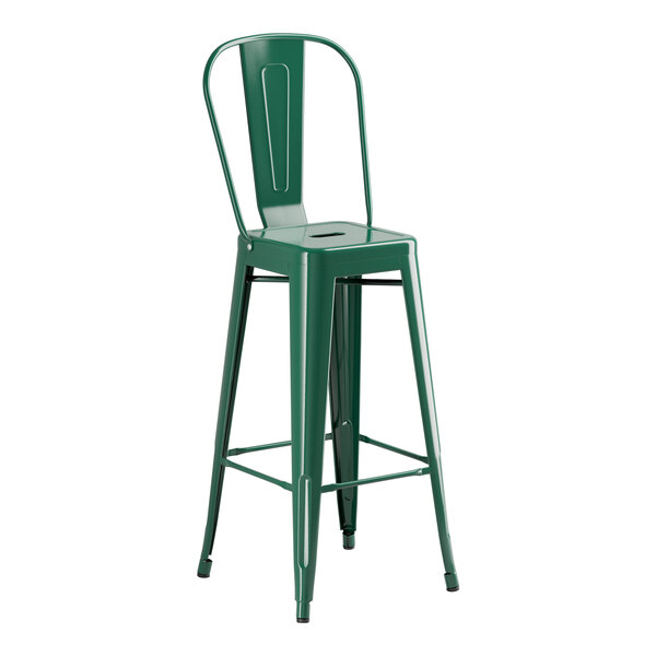 An emerald green metal barstool with a backrest.