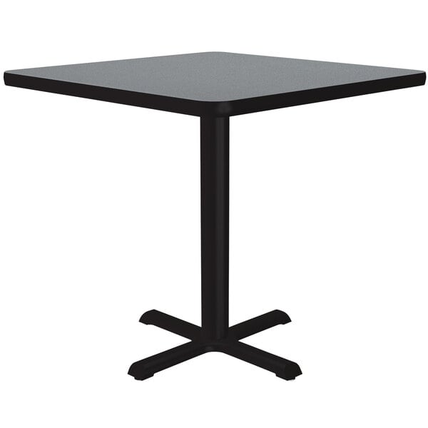 A gray square table with a black base.