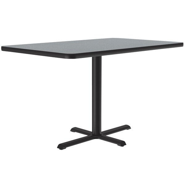 A rectangular Correll gray granite finish table with a black base.