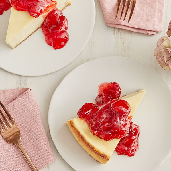 A slice of cheesecake with Rich's Allen strawberry filling on top on a plate.