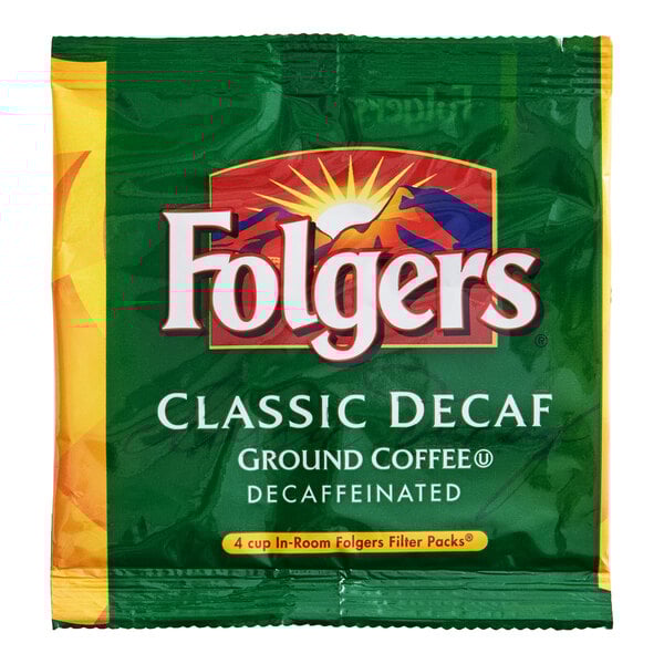 A packet of Folgers Classic Decaf ground coffee filter pack.