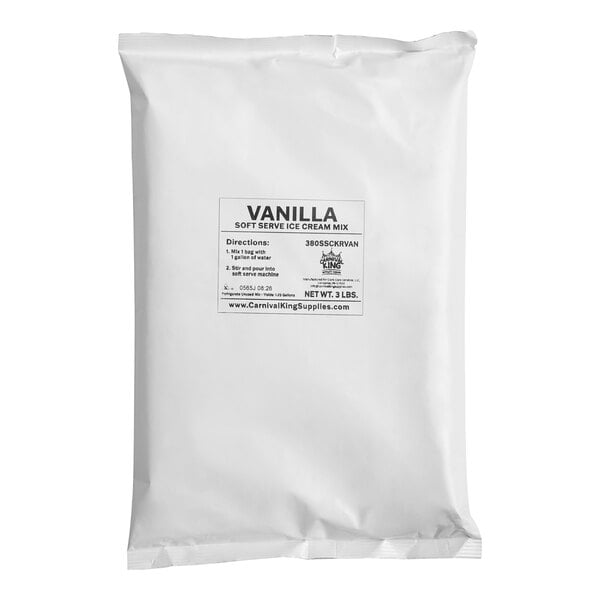 A white package of Carnival King Royalty Vanilla Soft Serve Ice Cream Mix with black text.