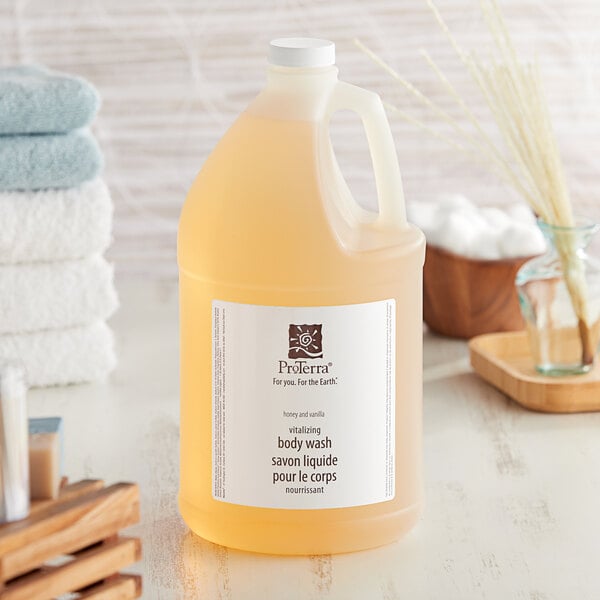 A ProTerra white-labeled jug of honey and vanilla body wash.