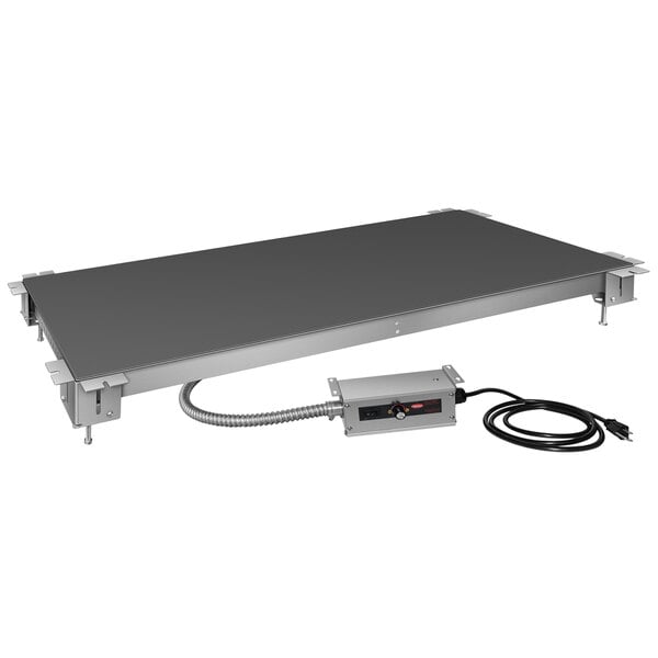 A grey rectangular Hatco built-in heated shelf warmer with a power cord.