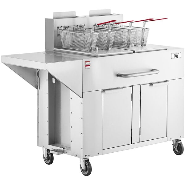 A Backyard Pro double tank outdoor fryer with wheels.