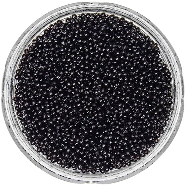 A glass jar full of black Bemka Black Tobiko.