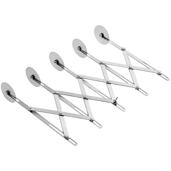 A Choice stainless steel pastry cutter with five wheels and three metal hooks.