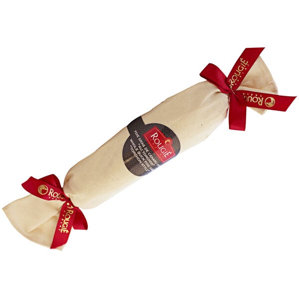 A white bag with red bows containing a Rougie Torchon Foie Gras.