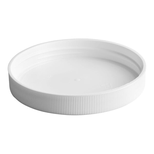 A white ribbed plastic cap with an unlined interior.