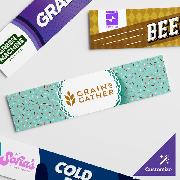 A white rectangular sign panel with white and blue background and white letters with a purple square.