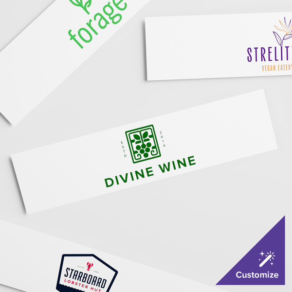 A white rectangular sign panel with purple and green text.