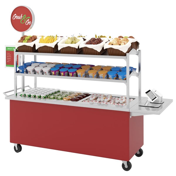 A candy apple red LTI breakfast cart with a variety of food items on it.