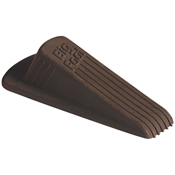 A brown cone shaped Master Caster rubber door stop with text on it.