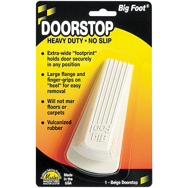 A package of beige Master Caster Big Foot rubber door stoppers.