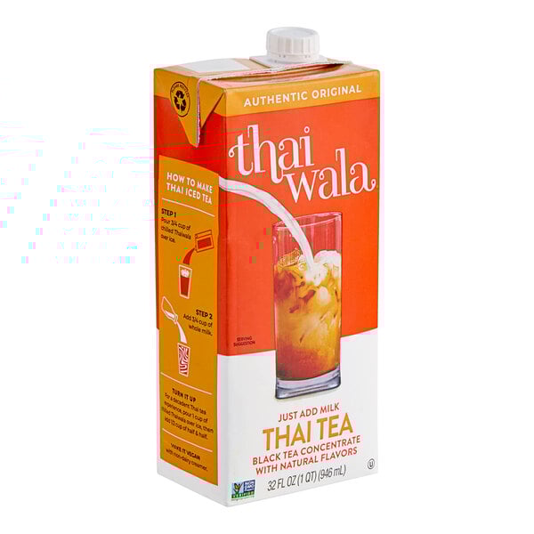 A carton of Thaiwala original Thai tea concentrate next to a glass of Thai tea.