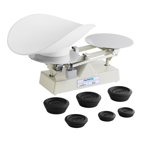 A baker's dough scale with a scoop and several round weights.