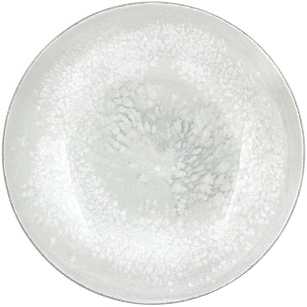 A white Bauscher porcelain coupe plate with a white rim.